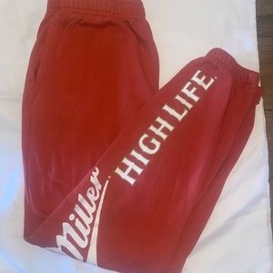 Small orange sweatpants